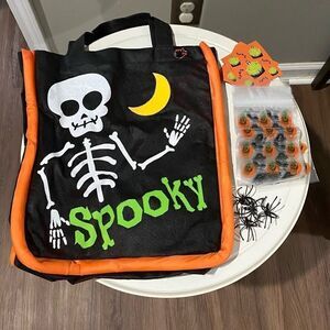 Light up trick or treat bag. NWOT. Comes with extra goodies.
